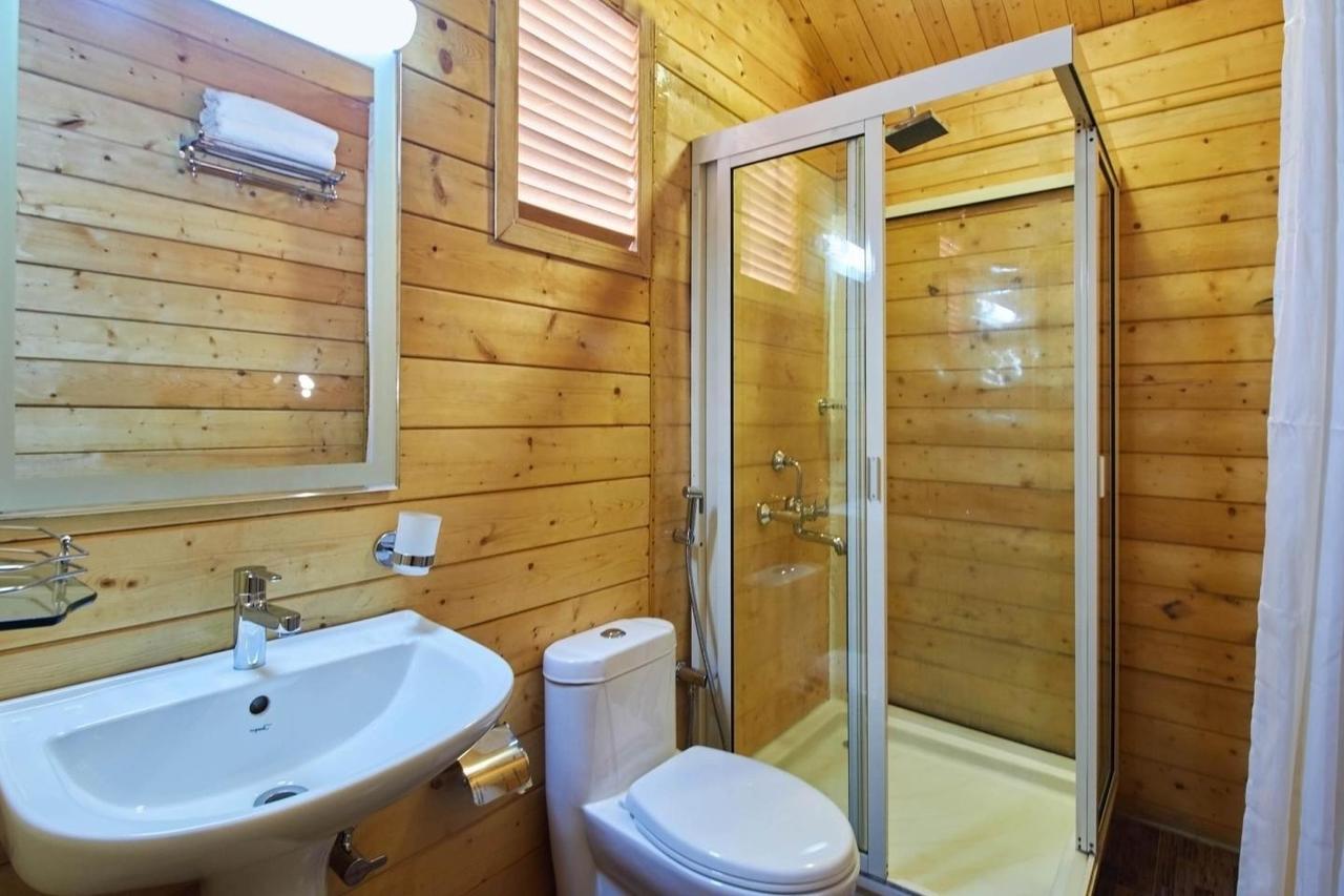Tiara Fiesta Beach Cottages Morjim Esterno foto