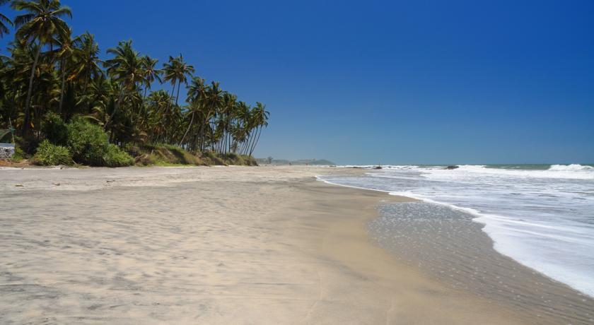 Tiara Fiesta Beach Cottages Morjim Esterno foto
