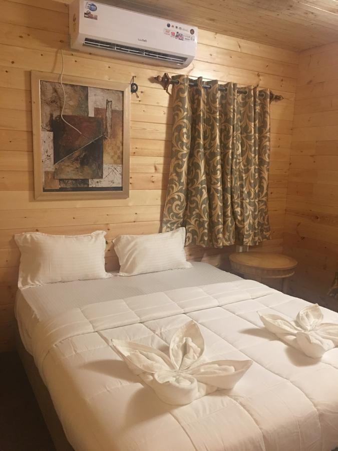 Tiara Fiesta Beach Cottages Morjim Esterno foto